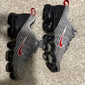 Nike Black and Gray Sneakers with Red Highlights